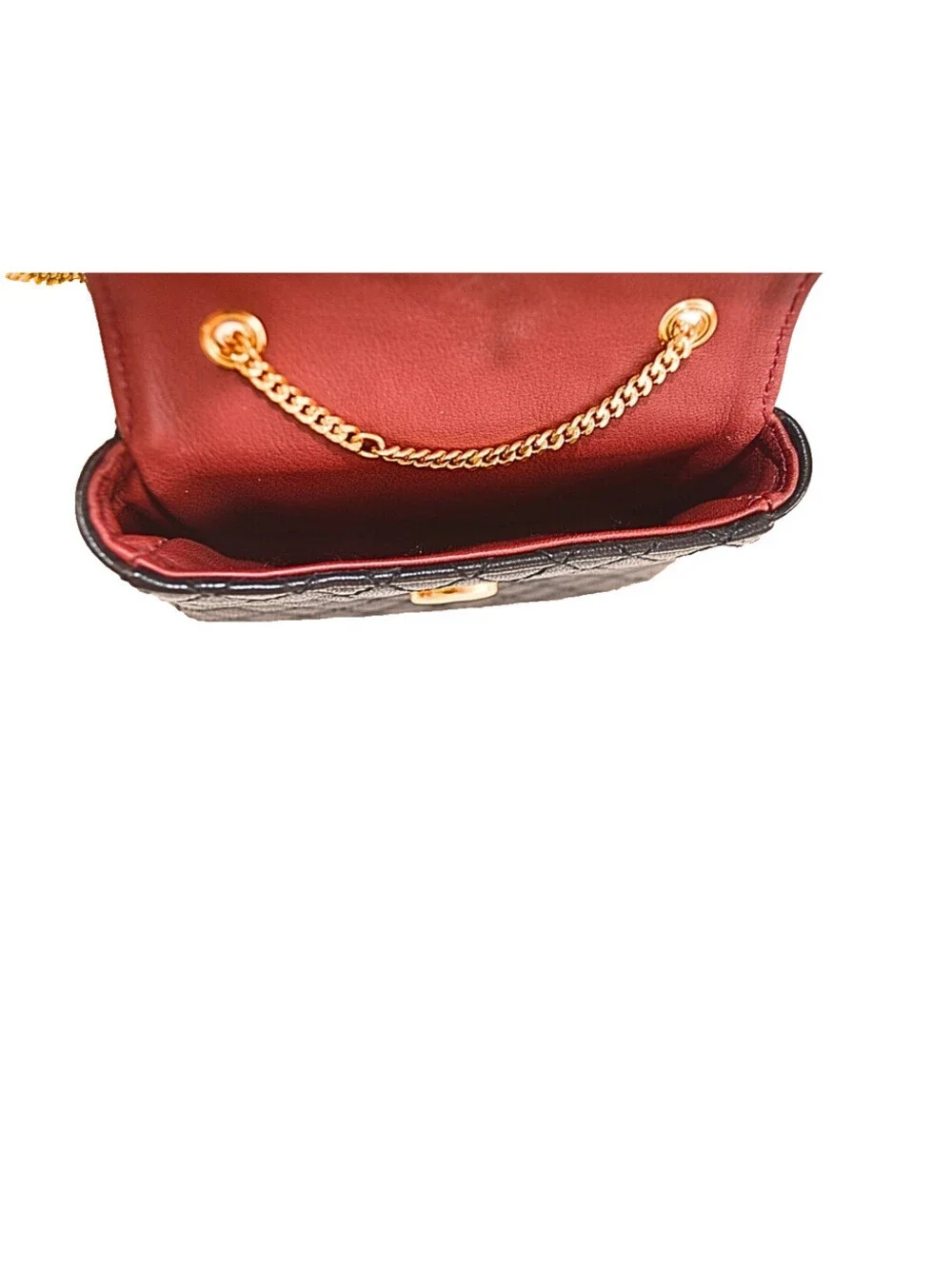 Chanel A Black Quilted Lambskin Leather Micro Flap Bag With Gold Hardware